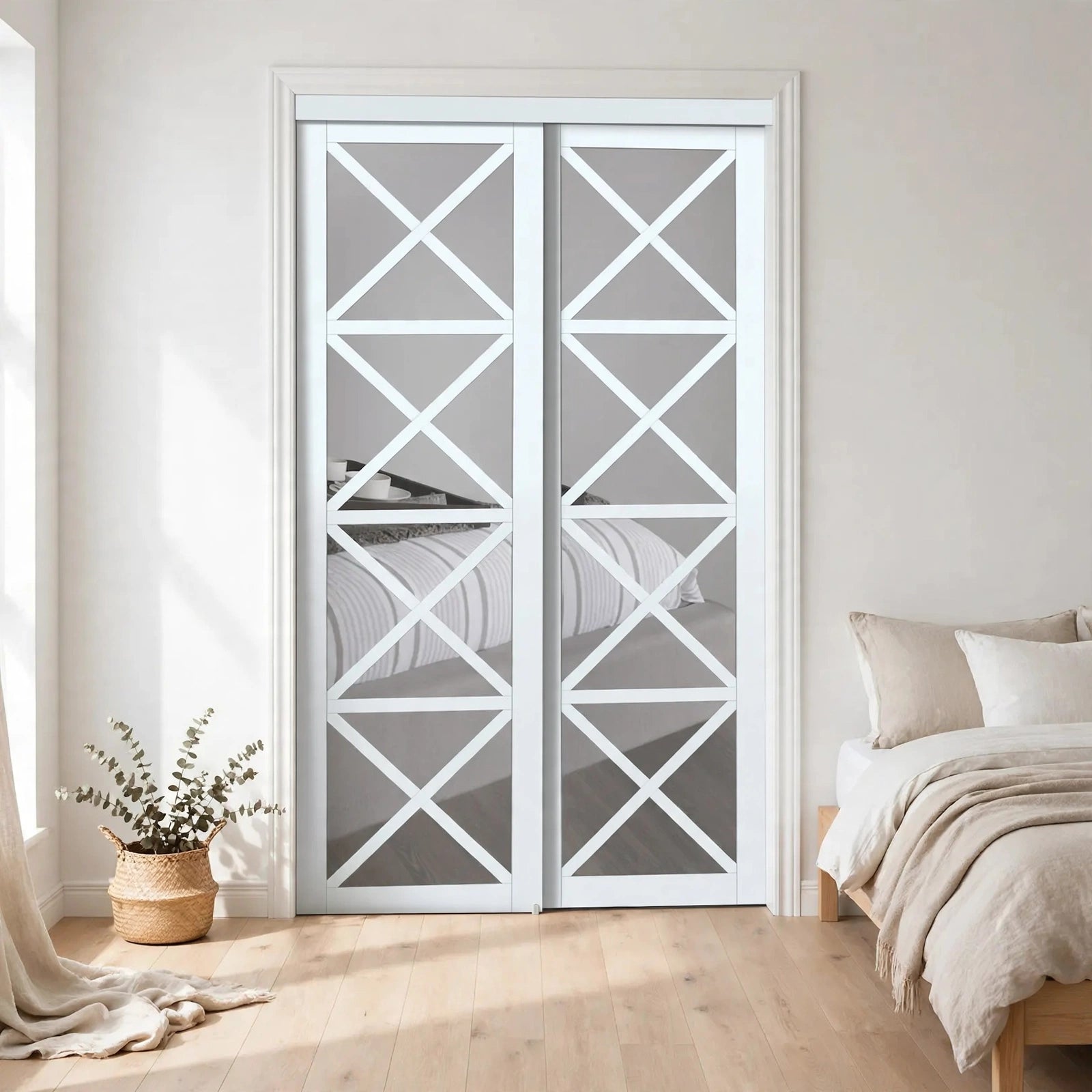 White K-shape sliding closet doors in a Nordic room