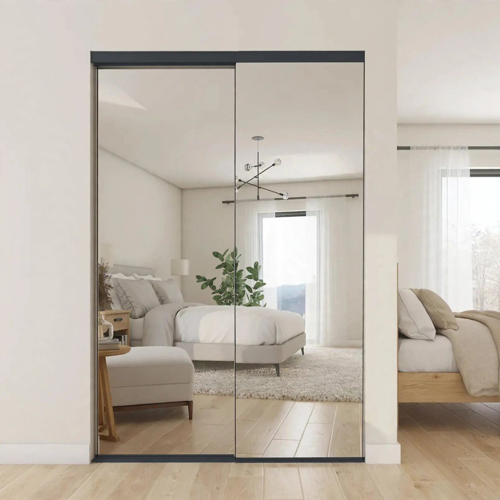 Mirrored closet doors with a matte black steel frame in a Nordic room